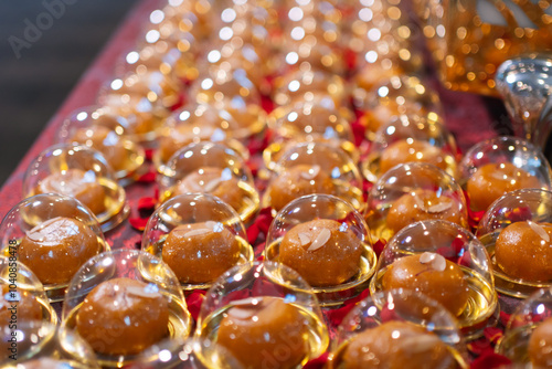 Round-shaped Balushahi individually packaged. photo