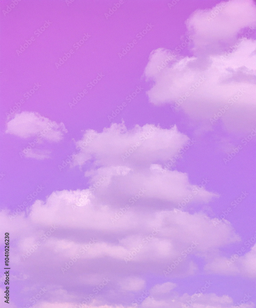 A peaceful scene of a pink sky dotted with soft, white cumulus clouds, perfect for backgrounds and design. A peaceful scene of a pink sky dotted with soft, white cumulus clouds, perfect for backgrounds and design.