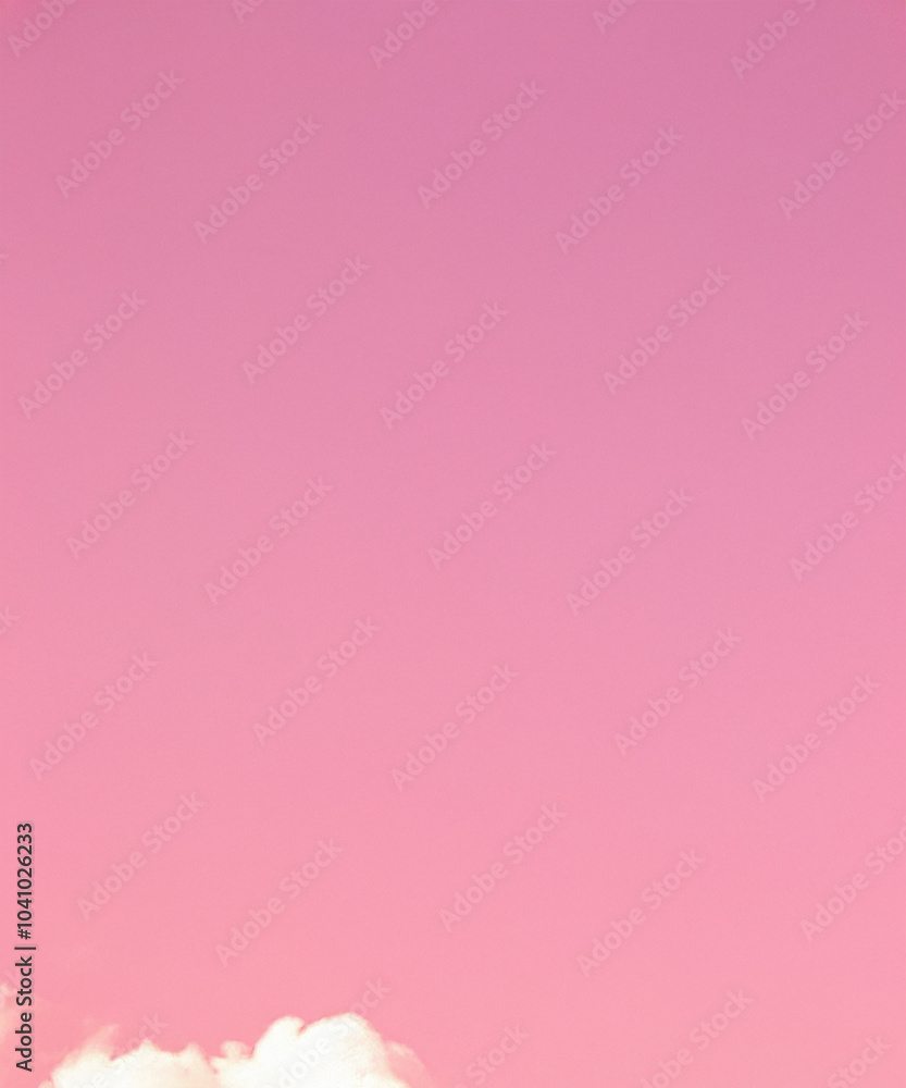 A peaceful scene of a pink sky dotted with soft, white cumulus clouds, perfect for backgrounds and design. A peaceful scene of a pink sky dotted with soft, white cumulus clouds, perfect for backgrounds and design.
