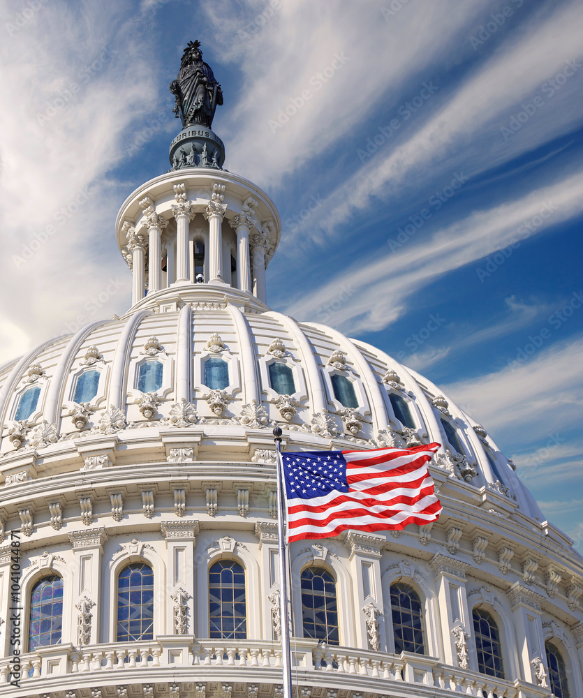 US Capitol dome and American waving flag in Washington DC with blue sky ...