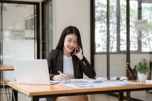 Confident Businesswoman on a Productive Call 