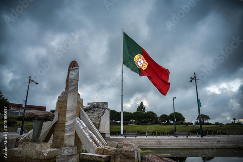 Portuguese Flag at Parque Eduardo VII under Cloudy Skies - Lisbon, Portugal