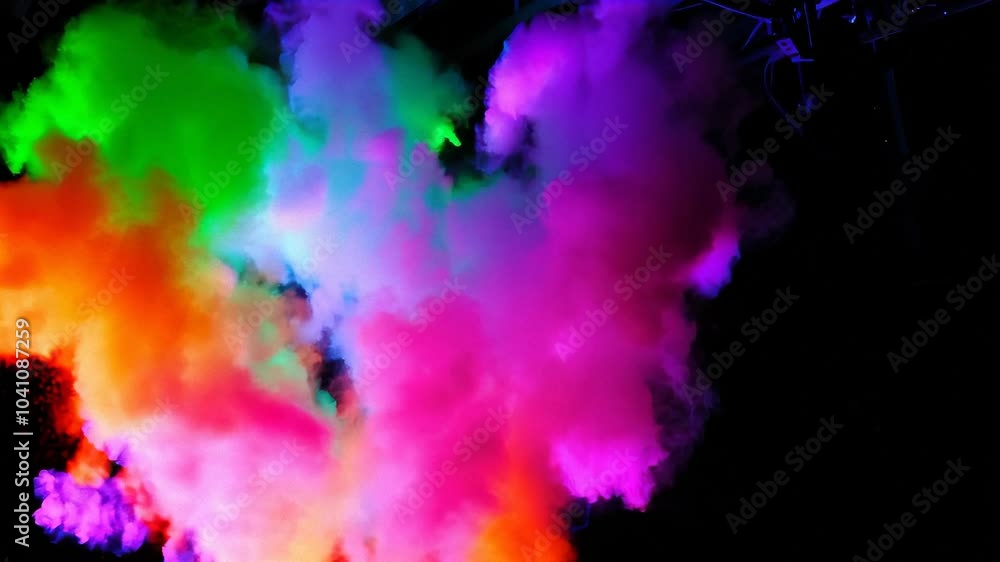 A slow-motion capture of a vibrant color explosion, showcasing the dynamic spread of colors in the air. A slow-motion capture of a vibrant color explosion, showcasing the dynamic spread of colors in the air.