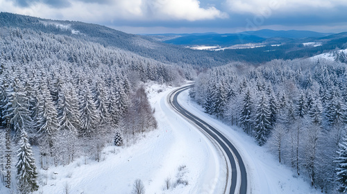 Snowy forest road in Polish mountains