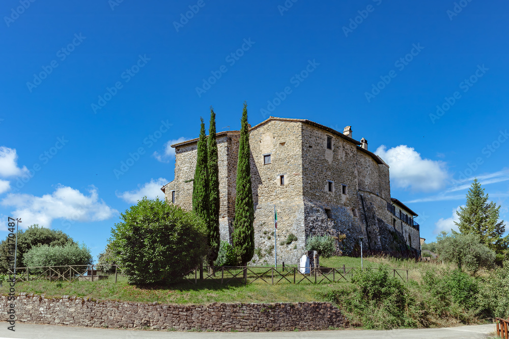 The historic Collemancio castle in the Topino River floodplain near Canara, Umbria, showcasing medieval architecture and natural beauty. Village Collemancio - Italian national heritage