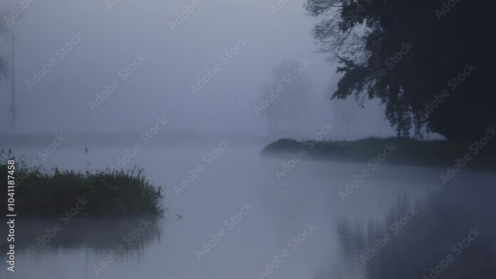 Misty, serene river scene with fog enveloping the landscape, creating a tranquil and mysterious atmosphere Misty, serene river scene with fog enveloping the landscape, creating a tranquil and mysterious atmosphere