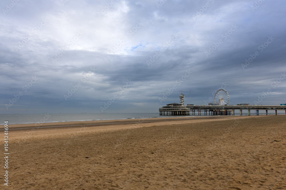 Fototapeta premium view of the ferris wheel on the beach of the Hague Netherlands North Sea