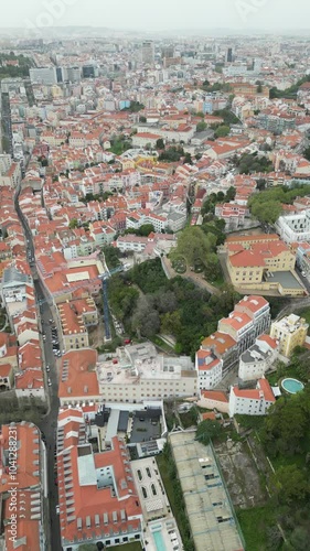 Vertical drone shot of reed roofs of Lisabon the capital of Portugal. Travel destinations in Europe
