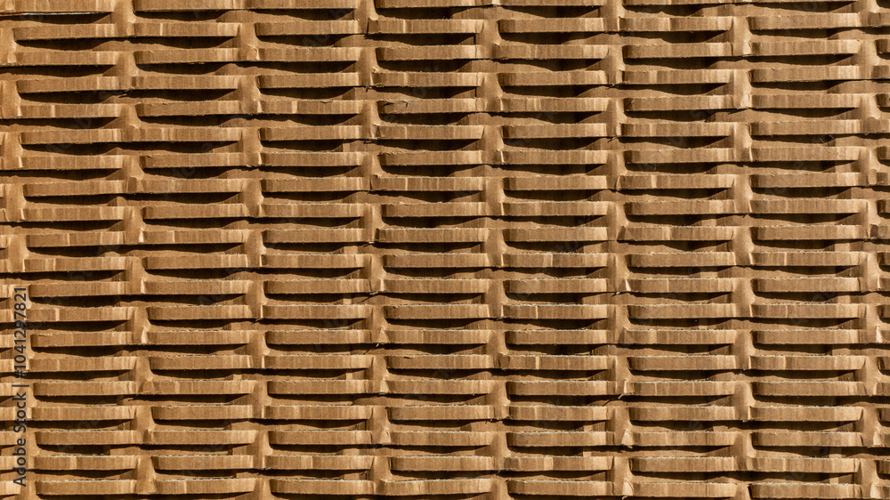 Stacked cardboard boxes create a textured pattern, symbolizing sustainability and recycling concepts, ideal for Earth Day themes Stacked cardboard boxes create a textured pattern, symbolizing sustainability and recycling concepts, ideal for Earth Day themes