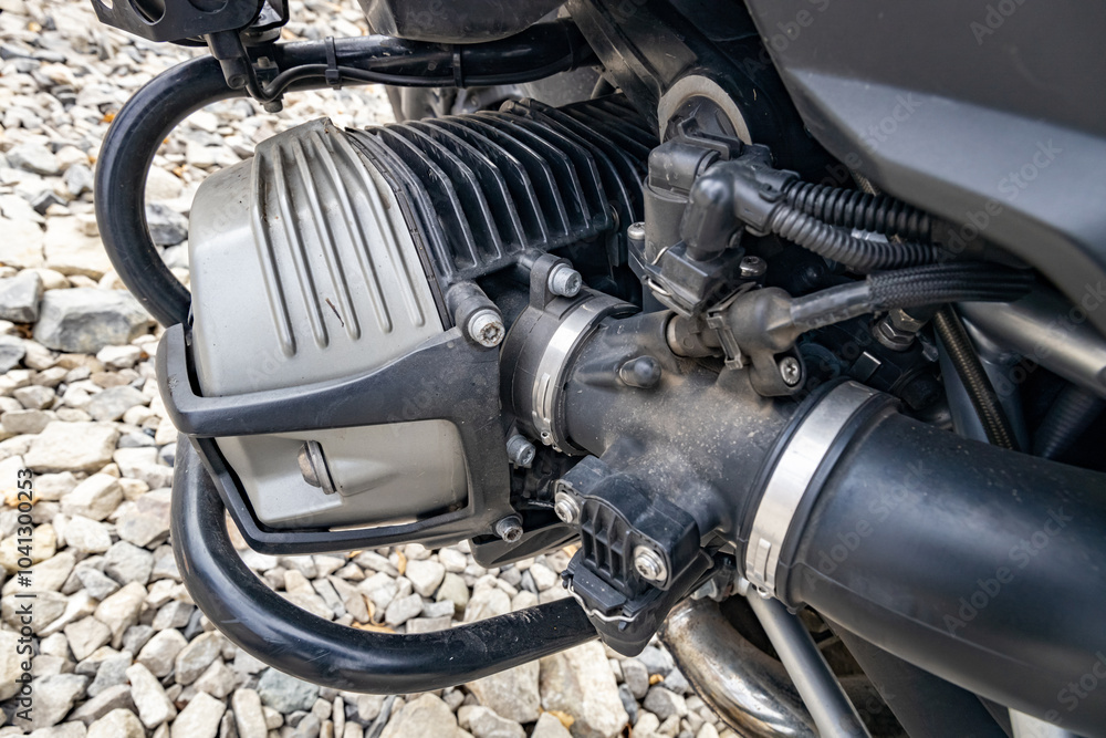 Fototapeta premium View of a part of a motorcycle engine, left cylinder of an opposed engine.