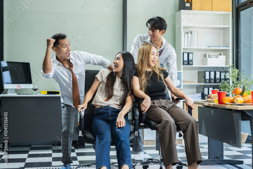 Asian business team are excited business success with inspiration from their excellent financial results, celebration successful deal with champagne and pizza in the workplace.