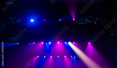 Colorful concert lights on empty stage