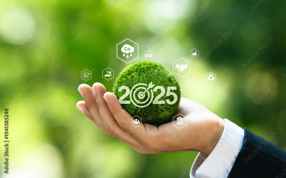 Green globe with 2025 Sustainable environment development goals. SDGs, ESG, Net Zero, and emission carbon neutral concept of business corporate. World earth day, Technology transition to save earth Green globe with 2025 Sustainable environment development goals. SDGs, ESG, Net Zero, and emission carbon neutral concept of business corporate. World earth day, Technology transition to save earth