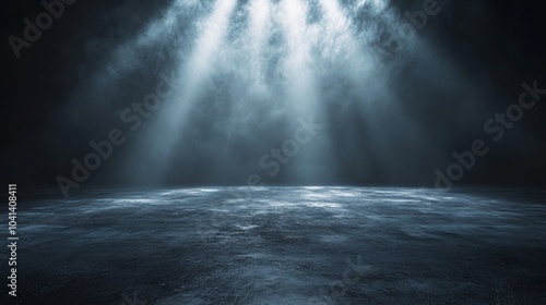 A dark, empty field with a blue sky in the background