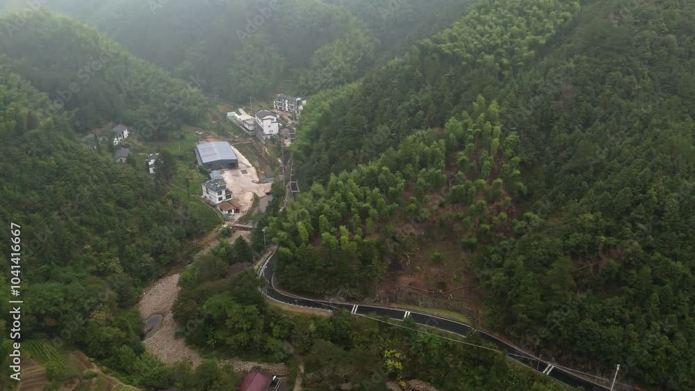 Aerial photography of green clouds, mountains, forests and villages in the mountains of southern Anhui Aerial photography of green clouds, mountains, forests and villages in the mountains of southern Anhui