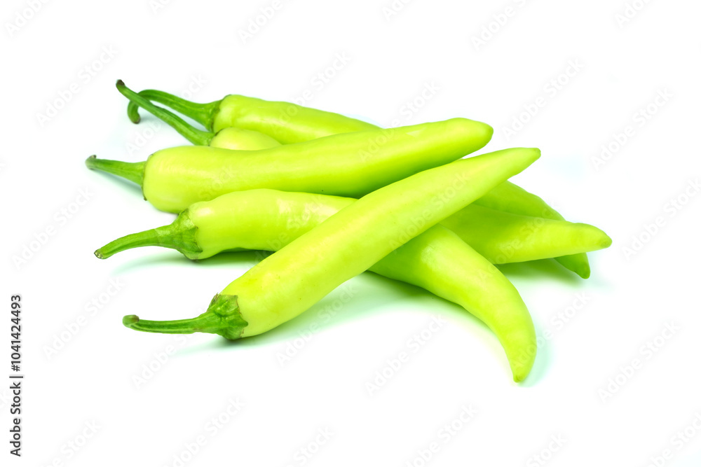 Heap of Fresh Big Green Chillies Pepper (Capsicum frutescens)isolated on white background close up Heap of Fresh Big Green Chillies Pepper (Capsicum frutescens)isolated on white background close up