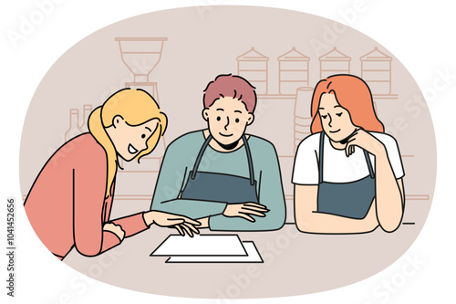 Cafe owners stand behind bar, consulting with professional female restaurateur and reading out business plan. Businesswoman holding meeting with cafe staff and discussing organizational issues.
