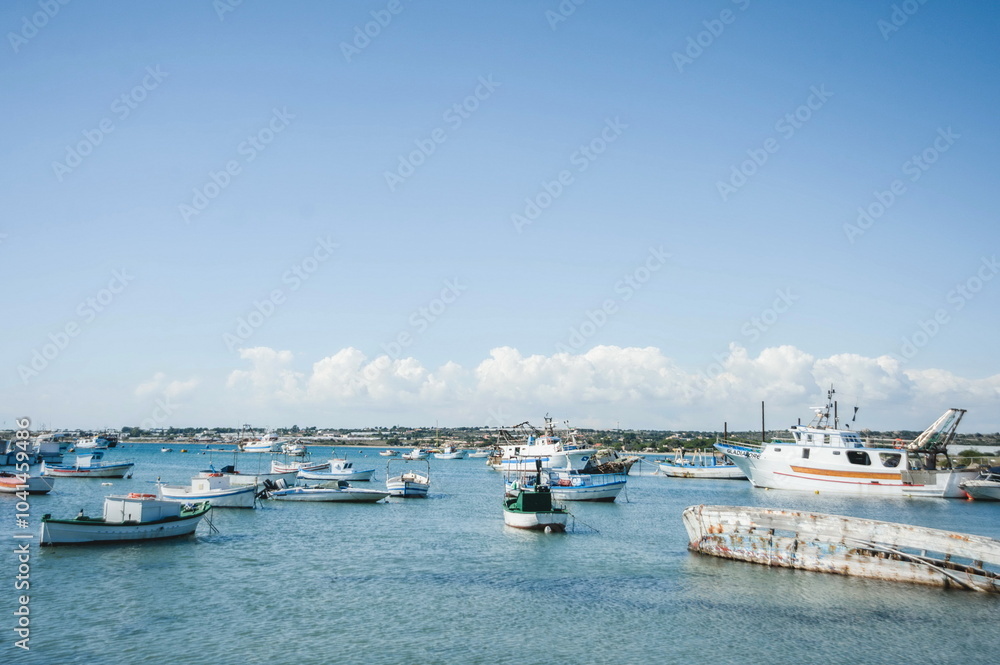 fishing boats in harbour in Portopalo in Sicily fishing boats in harbour in Portopalo in Sicily