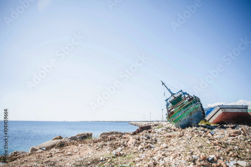 fishing boats in harbour in Portopalo in Sicily photo