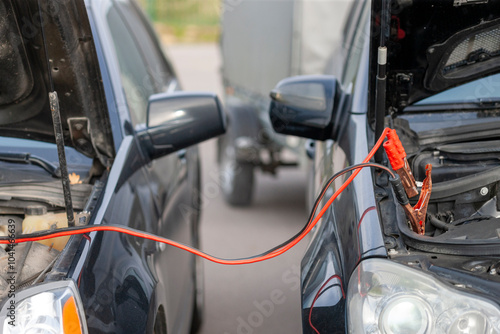 cars connected with jump leads