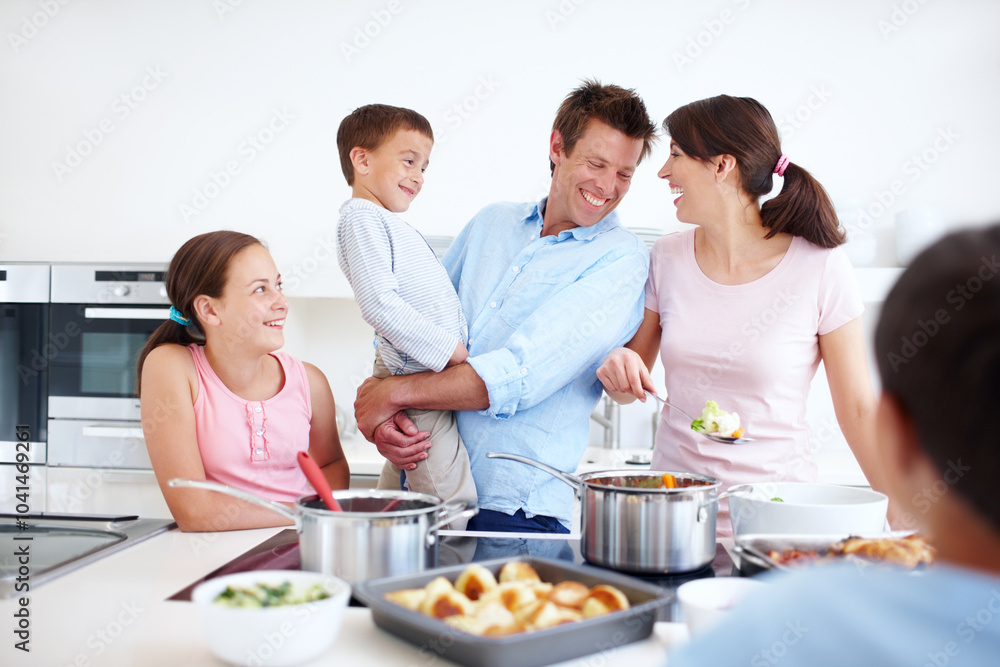 Family, excited and cooking in kitchen with support, Thanksgiving celebration and love. Parents, children and happy in home for meal preparation, nutritional lunch and smile in apartment for learning Family, excited and cooking in kitchen with support, Thanksgiving celebration and love. Parents, children and happy in home for meal preparation, nutritional lunch and smile in apartment for learning
