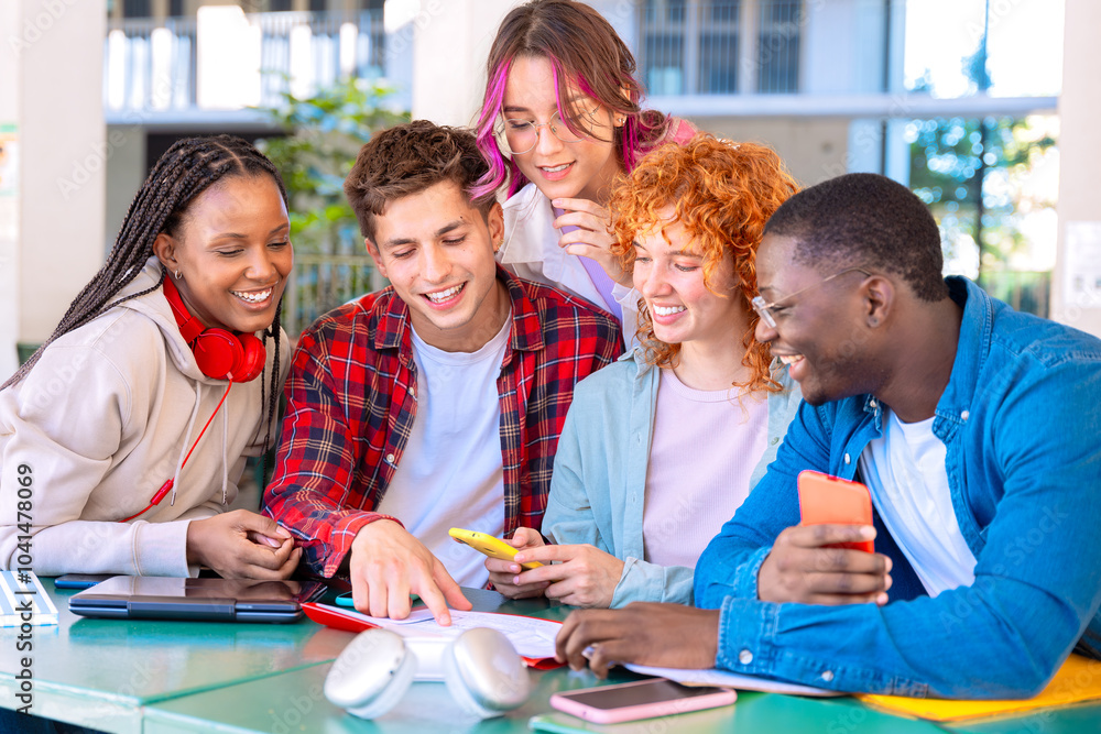 Group happy teenage students talking with university notes. and smartphones Group happy teenage students talking with university notes. and smartphones