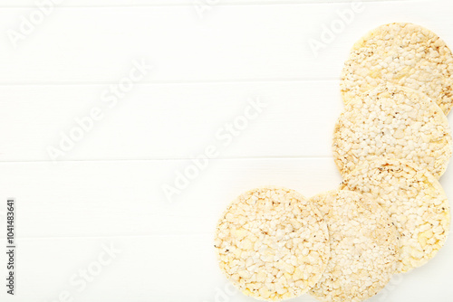 Rye crispbread on white wooden table photo