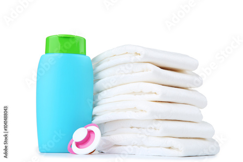 Obraz na płótnie Baby diapers with bottle and pacifier on white background w salonie