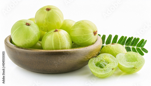Closeup Indian gooseberry fruits ( phyllanthus emblica, amla ) in rattan basket and slice with green leaf isolated on white background. Top view. Flat lay.
