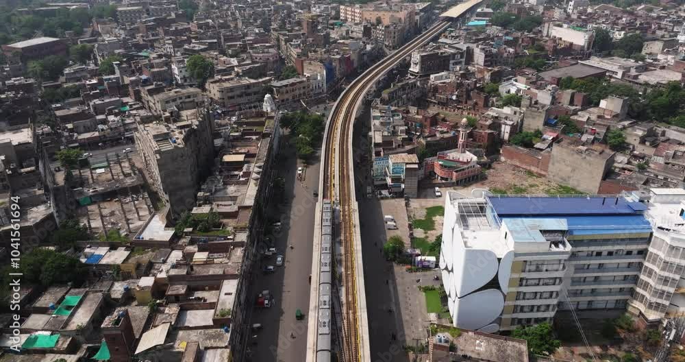 Lahore Subway Train Departs Station in Densely Crowded Pakistan City Lahore Subway Train Departs Station in Densely Crowded Pakistan City