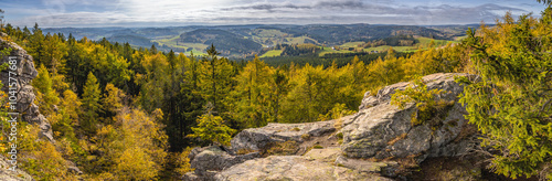 Panorama from rocky view point over beautiful colorful autumn landscape