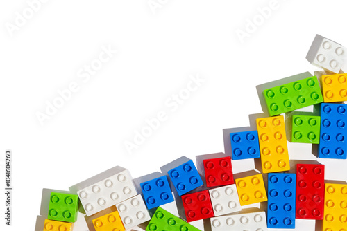 Top view of many colorful plastic blocks bricks toy for building constructions on blank png isolated background in corner. The concept of children's educational games. Place for your text and design