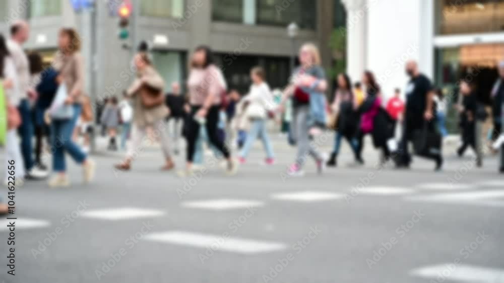 Blurred view of people walking on the street Blurred view of people walking on the street