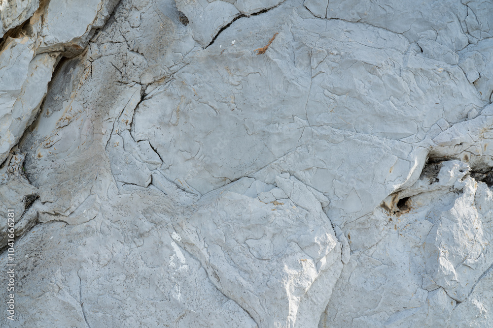 Fototapeta premium Black white rock texture. Rough mountain surface. Stones texture and background. Surface of the cave rock wall. Rock texture