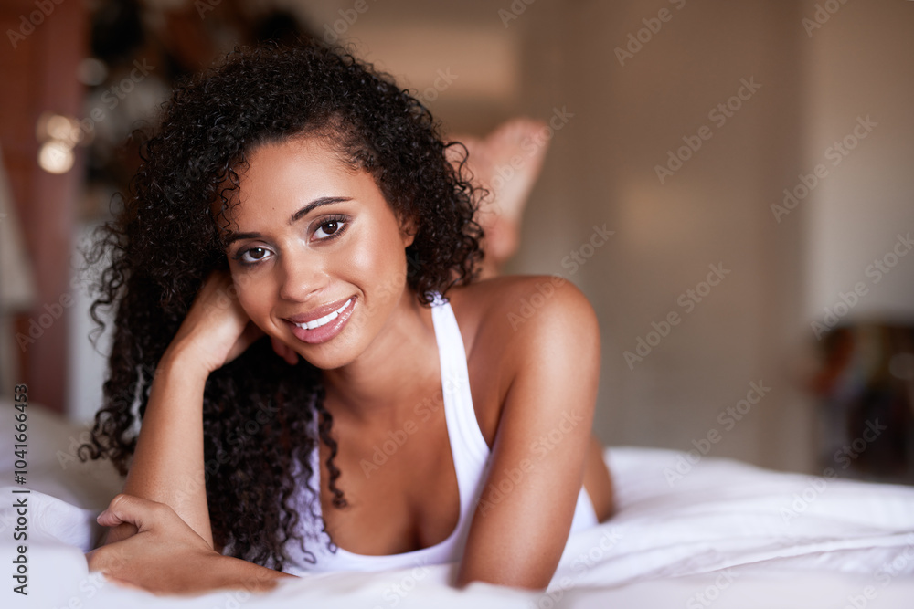 Portrait, African and woman relax in bedroom for comfort, calm morning and wake up from nap on weekend. Smile, girl and resting on bed for awake, break peace and start with routine wellness at house Portrait, African and woman relax in bedroom for comfort, calm morning and wake up from nap on weekend. Smile, girl and resting on bed for awake, break peace and start with routine wellness at house