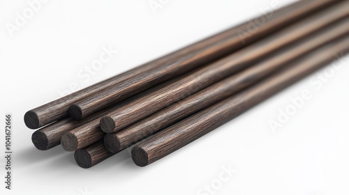 A set of wooden chopsticks arranged neatly on a white background.