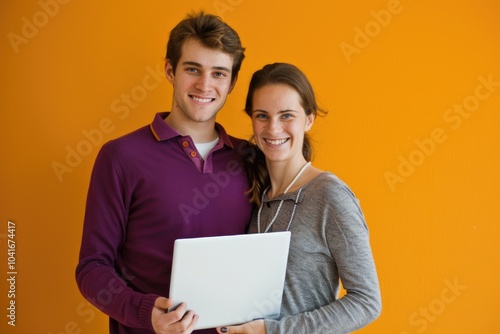 A couple using a laptop together