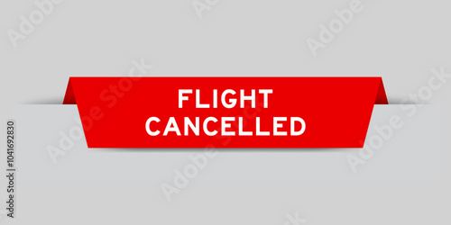 Red color inserted label with word flight cancelled on gray background