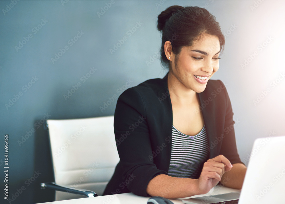 Technology, businesswoman with laptop and at her desk of a modern workplace office. Social networking or online communication, connectivity and female person typing an email at her workstation Technology, businesswoman with laptop and at her desk of a modern workplace office. Social networking or online communication, connectivity and female person typing an email at her workstation