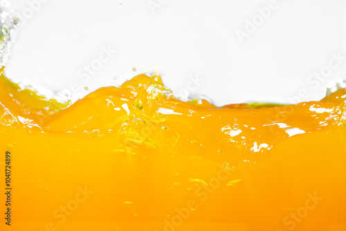 Close up bright orange juice splash texture for health and nature waves, Beautiful waves curve and little bubbles smooth for garphic design and background photo