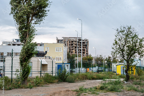 The remains of city buildings after massive artillery shelling airstrikes. photo