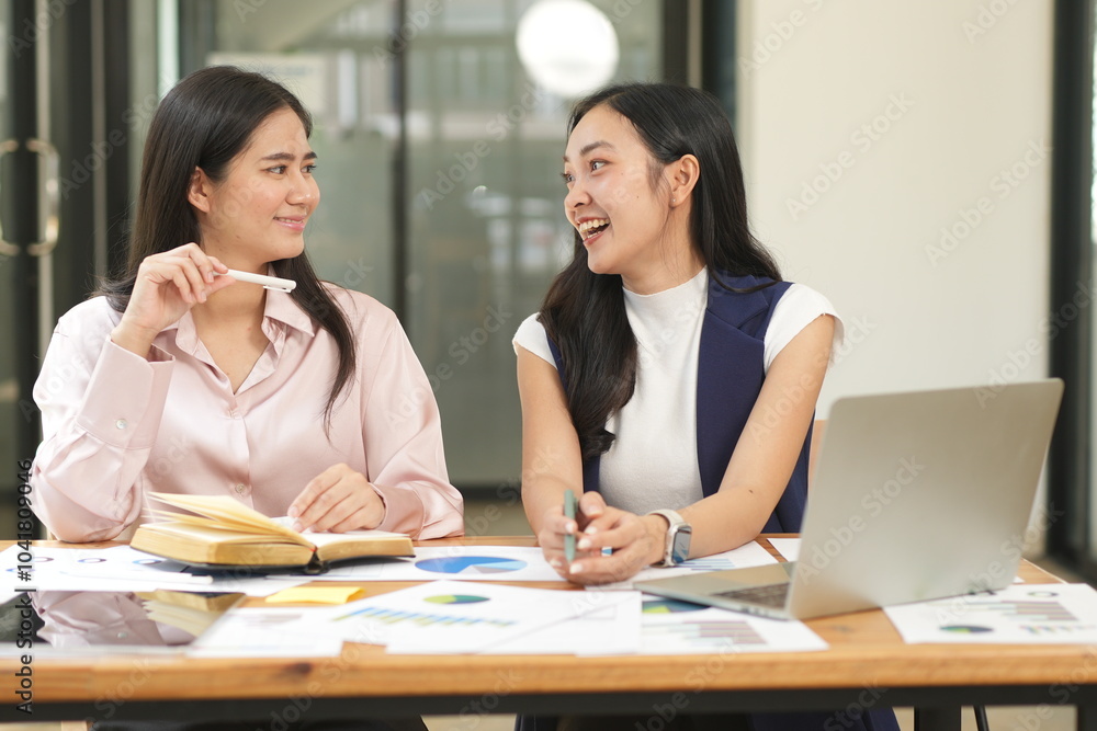 Asian woman succeeds at office Asian woman succeeds at office