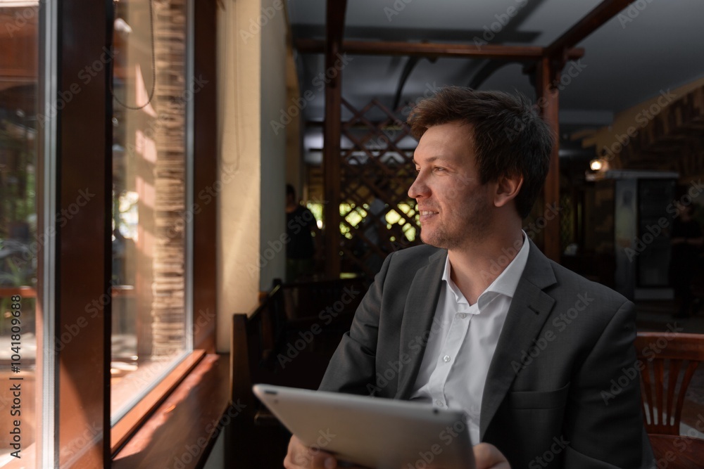 Fototapeta premium Happy man in coffee work on laptop