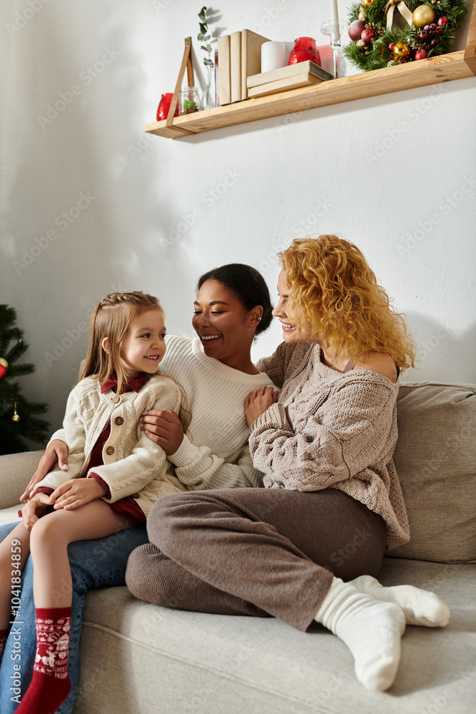 A beautiful couple enjoys quality time with their daughter while embracing warmth and love. A beautiful couple enjoys quality time with their daughter while embracing warmth and love.