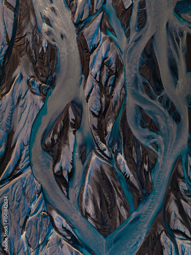 Obraz na płótnie View from above, stunning patterns created in the volcanic sands of Iceland. As glaciers melt the water flows as rivers out to sea. Natural pattern, background, wallpaper. w salonie
