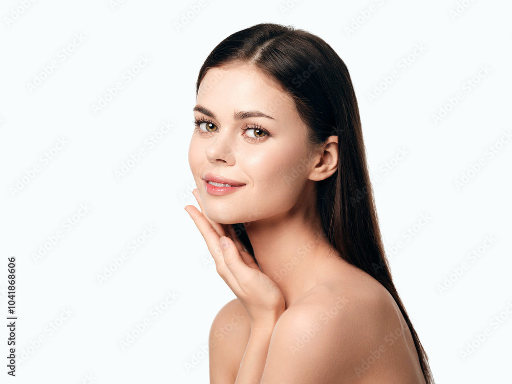 Beautiful young woman with hands on face, isolated on white background, skin care and beauty concept Beautiful young woman with hands on face, isolated on white background, skin care and beauty concept