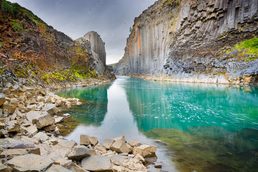 Naklejka premium Stuðlagil Canyon known for its columnar basalt rock formations, Iceland