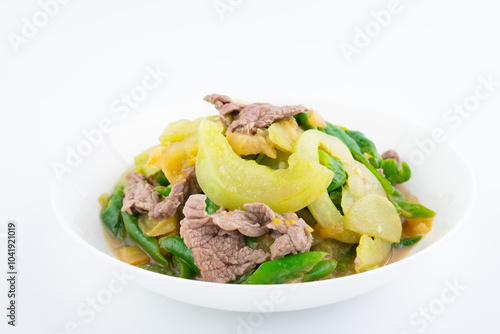 A dish of home-cooked green tomato beef