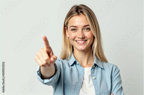 Wallpaper Mural Confident Professional Woman Smiling and Pointing, Representing Leadership, Direction, and Positivity in a Modern Business Environment Torontodigital.ca