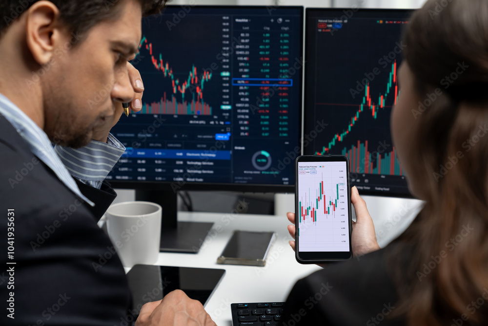 Focusing on phone with discussing dynamic stock market in two business traders online website compare with pc screens in real time currency rate investment on risk data at modern office. Postulate. Focusing on phone with discussing dynamic stock market in two business traders online website compare with pc screens in real time currency rate investment on risk data at modern office. Postulate.